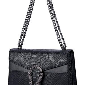 square shoulder bag made of high quality PU leather. Surface embossing printing